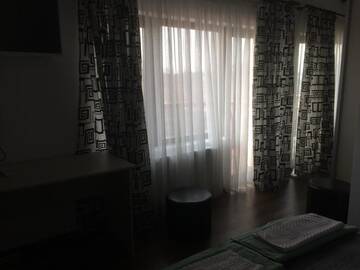 Фото номера Стандартный номер с кроватью размера &quot;king-size&quot; Отель Pensiunea Casa Lupas г. Джилэу 17